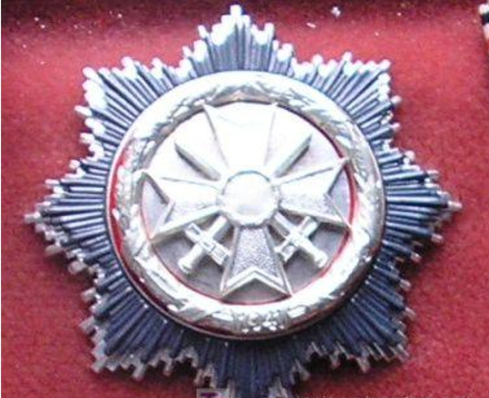 German Cross, or fried egg in Silver category.