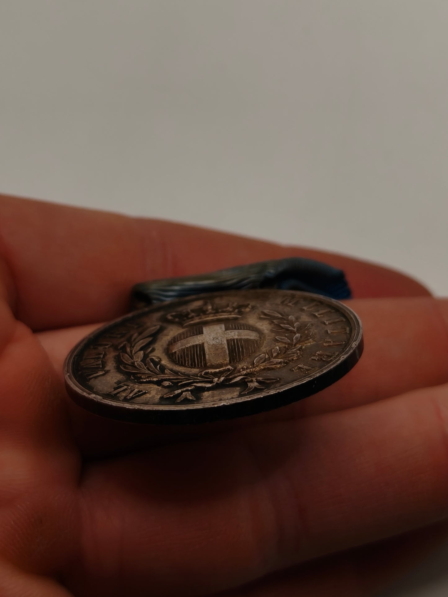 Italienische Tapferkeitsmedaille. Luftfahrt Zweiter Weltkrieg. Name Rückseite