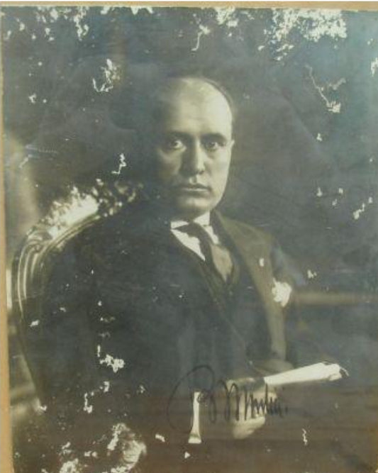 Mussolini's handsignature on photograph.