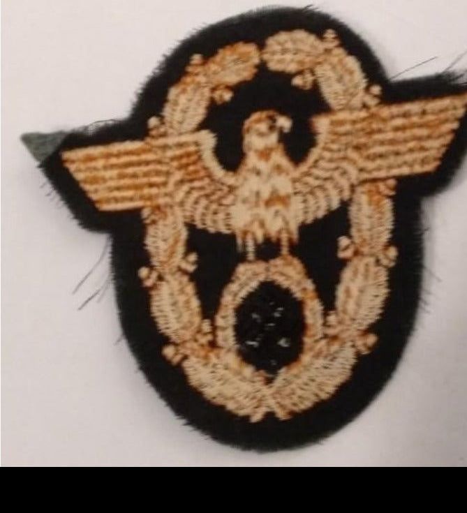Águila del brazo de la policía militar de campo 