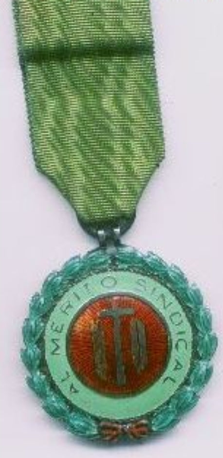 Franco period Trade Union Merit Medal.  Silver & enamel.  Comes with another related medal & a badge